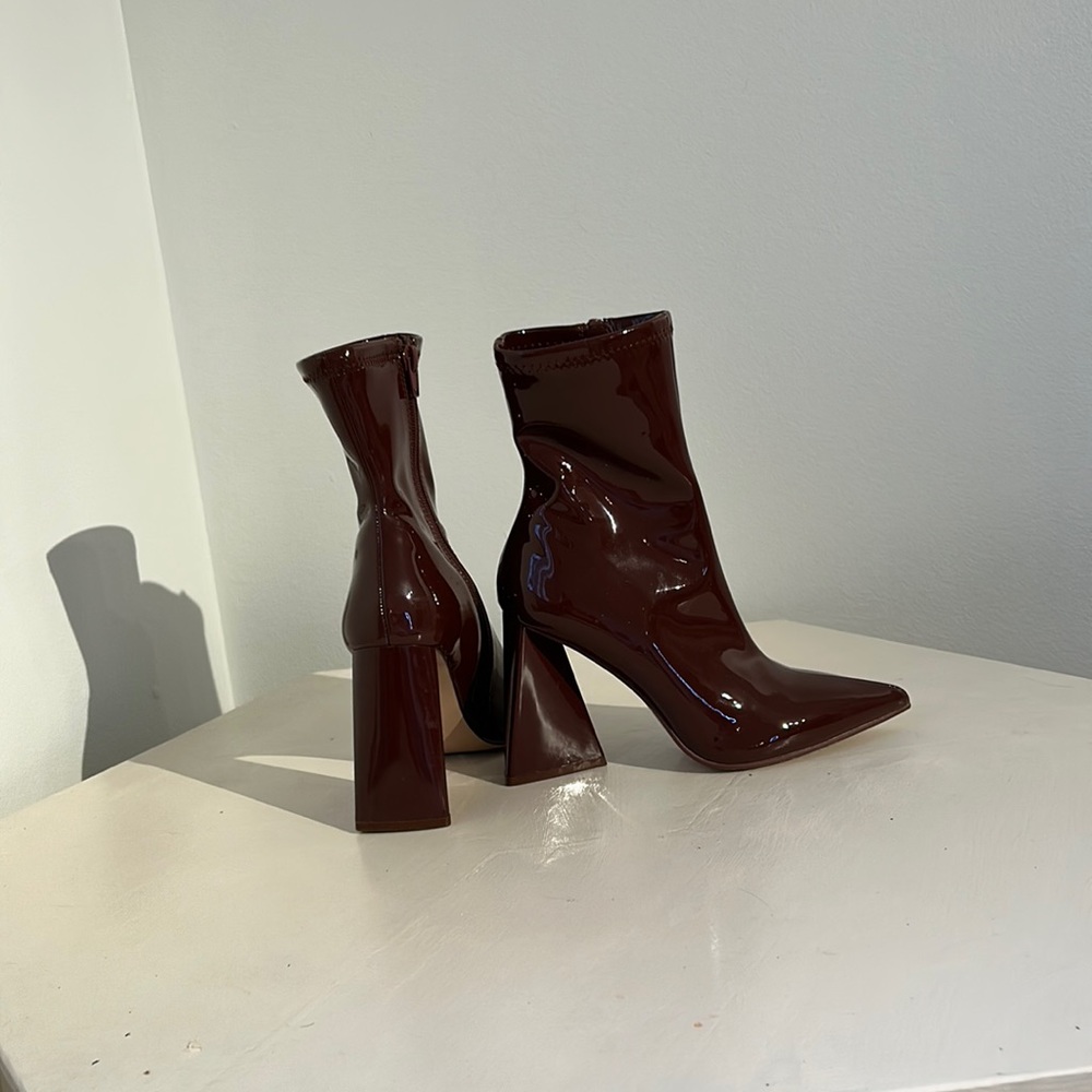 Brown shiny faux leather boots